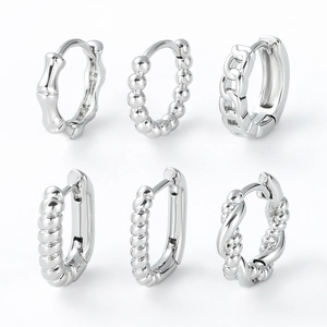 Classic silver geometric hoop earrings set with bamboo, chain, and twisted rope designs