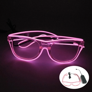 Detailed view of pink LED glowing glasses with wired battery pack for party music festivals