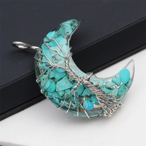 Detail showing life tree wire wrapped moon pendant with green turquoise stones