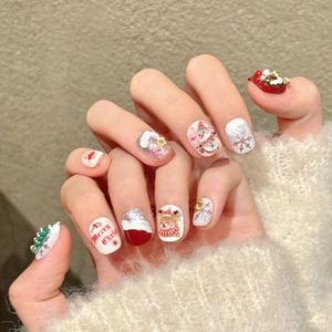 Christmas handmade press-on nails with 3D snowman, reindeer and snowflake patterns