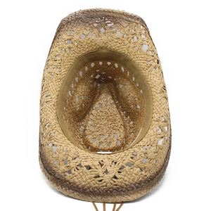 Detail view of hollow straw cowboy hat showing gradient weave and inner sweatband