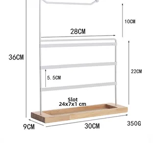 Detailed size overview of a multi-tier white metal earring stand with a solid wooden base