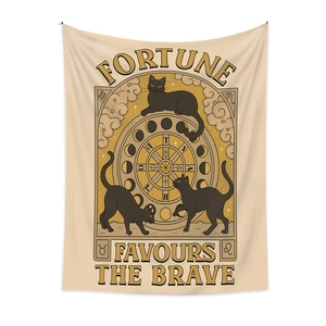 Detail of Fortune Favours The Brave tarot tapestry with black cats and golden wheel motif