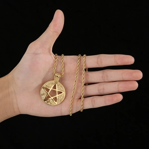 Close-up of hip-hop star pendant necklace in 18K gold plated stainless steel
