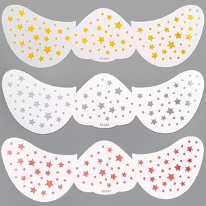 Detailed view of K92002 metallic star freckle tattoos in gold, silver and pink tones