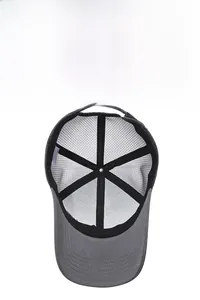 Detail view of breathable mesh lining and reinforced stitching on a grey baseball cap