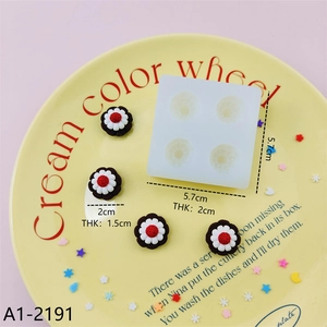 Detailed view of translucent 4-cavity silicone flower mold with dimension markings