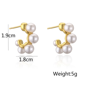 Elegant C-shaped 18K gold plated hoop earrings with white pearls and polished finish
