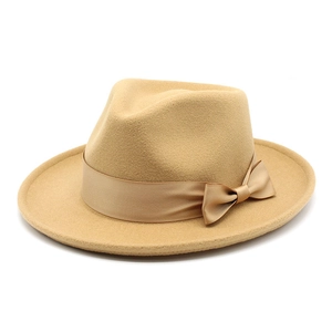 Elegant khaki wool fedora hat with a stylish bow ribbon detail on white background