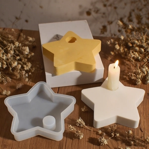 Macro detail of star-shaped silicone mold for DIY resin candle holders with finished bases