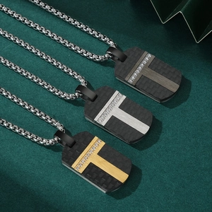 Carbon fiber necklaces with gold, silver, and grey accents and inlaid diamonds