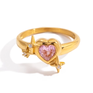 Golden ring featuring a pink heart zircon and star-shaped accents on white background