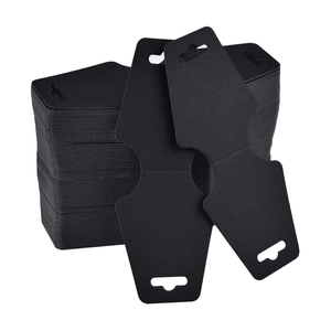 Stack of black foldable paper necklace display cards with hanging hooks for jewelry