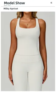 Detail of ribbed knit yoga set in creamy apricot featuring U-neck top and high waist pants