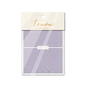 Close-up of MS-58 5D embossed nail stickers with purple gingham and bear patterns