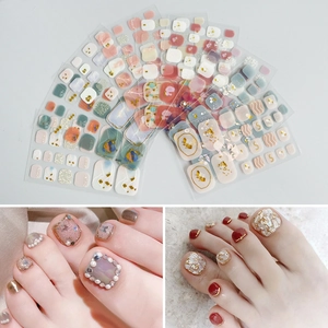 3D bronzing toe nail stickers with marble patterns, gold foil, and pearl accents