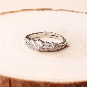 Close-up of a silver adjustable double-layer ring with sparkling pave zirconia accents