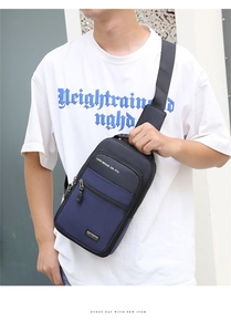Detailed view of durable Oxford fabric waist bag with adjustable straps and zipper pockets