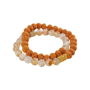 Double-layer bracelet with brown Rudraksha seeds, yellow quartz beads and gold metal accents