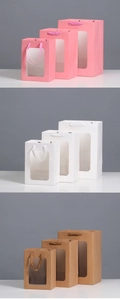 Three colors and sizes of paper gift bags with transparent windows and matching handles