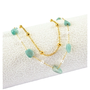 Bohemian double-layered gold bracelet with light green raw stones and white pearls