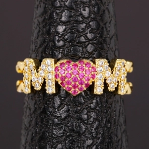 Gold MOM ring with heart-shaped pink cubic zirconia and pavé stones for Mother Day