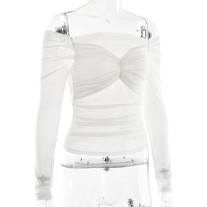 Close-up of white mesh off-shoulder top featuring ruched texture and twist knot detail