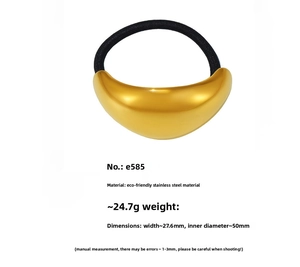 Detailed view of wide golden stainless steel bow hair tie with size and weight specs