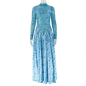 Detail of blue floral mesh dress featuring a high collar and sheer long sleeves
