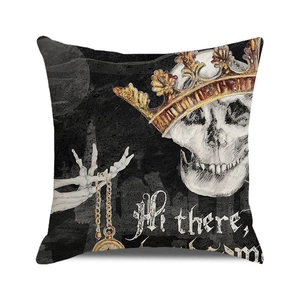 Detail of square Halloween cushion cover with skull, crown, and pocket watch design