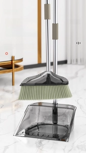 Detail of broom comb teeth on dustpan for hair cleaning with stainless steel handle