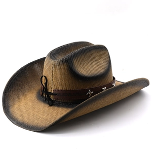 Close-up of a dark brown western cowboy hat with star studs on a leather band