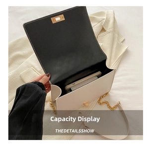 Interior view showing spacious capacity of the cream chain bag for a smartphone