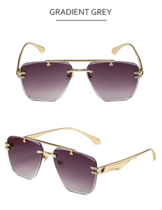 Detailed views of rimless gradient grey sunglasses with elegant gold metal temples