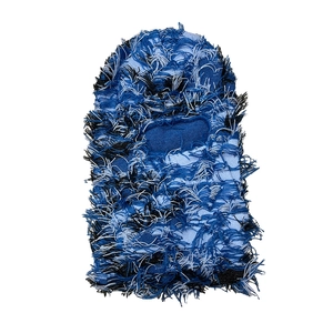 Close-up of distressed blue and black knitted balaclava with unique ripped textures
