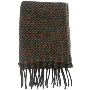 Close-up of multicolored knitted scarf with tassels featuring a dark woven texture