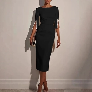 Elegant slim fit black midi dress with pearl embellished slit cuffs for workplace fashion