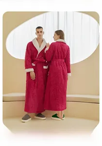Macro detail of rose red fleece bathrobe texture with 3D floral pattern and plush lining