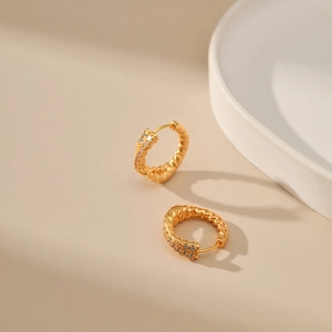 Chic 18K gold plated twisted hoop earrings with white zircon accents in elegant warm tones