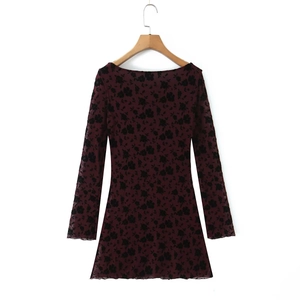 Dark red long sleeve mini dress with black floral print and scoop neck design