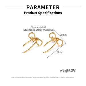 Close-up of gold stainless steel bow earrings with 28mm length and hollow design