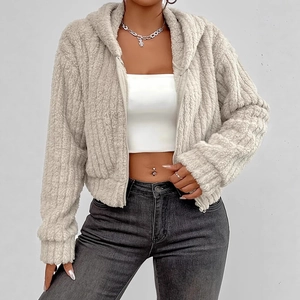 Detail of zip-up fuzzy hooded jacket featuring soft vertical striped faux fur texture