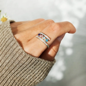Elegant S925 sterling silver ring with square multi-color zircons on a hand model