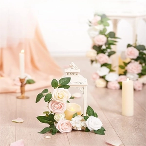Detailed view of artificial PE foam roses in pink and white for wedding decor