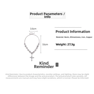 Detail view of rhinestone cross necklace with dimensions and resin material specifications