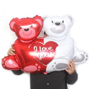 Giant hugging bears foil balloon with a red heart and I Love You text for birthday party