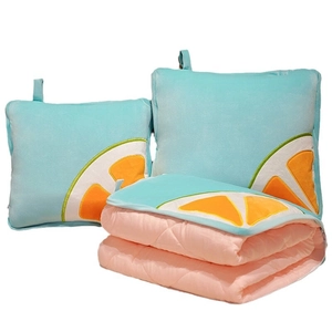 2-in-1 folding pillow blanket combo in blue and pink with orange fruit patterns