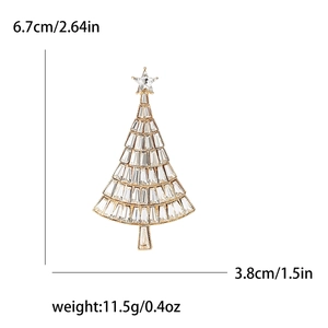 Elegant gold Christmas tree brooch with clear crystals and size markings in inches