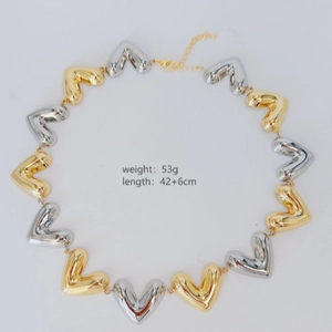 Vintage heart shaped collar necklace in gold and silver tones with lobster clasp