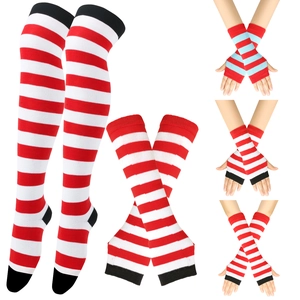 Detail of red and white striped knitted over-knee socks and arm warmer set for kids